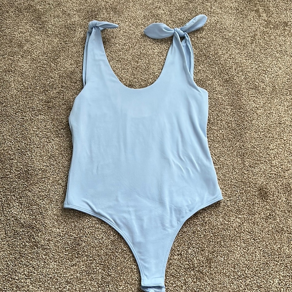 soft blue body suit